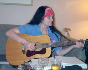 Leslie Fish with guitar