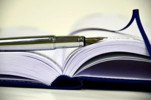 Pen and book