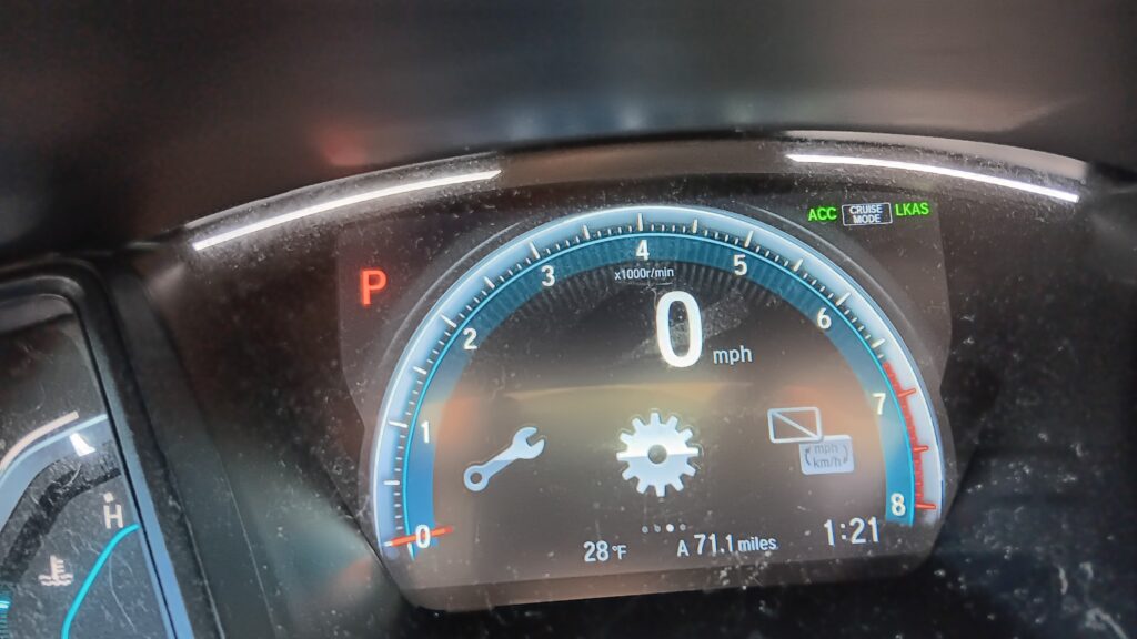 Honda dashboard showing gear icon